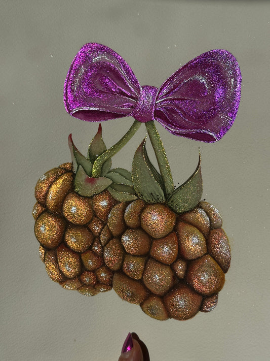 Golden raspberries in a purple kiss