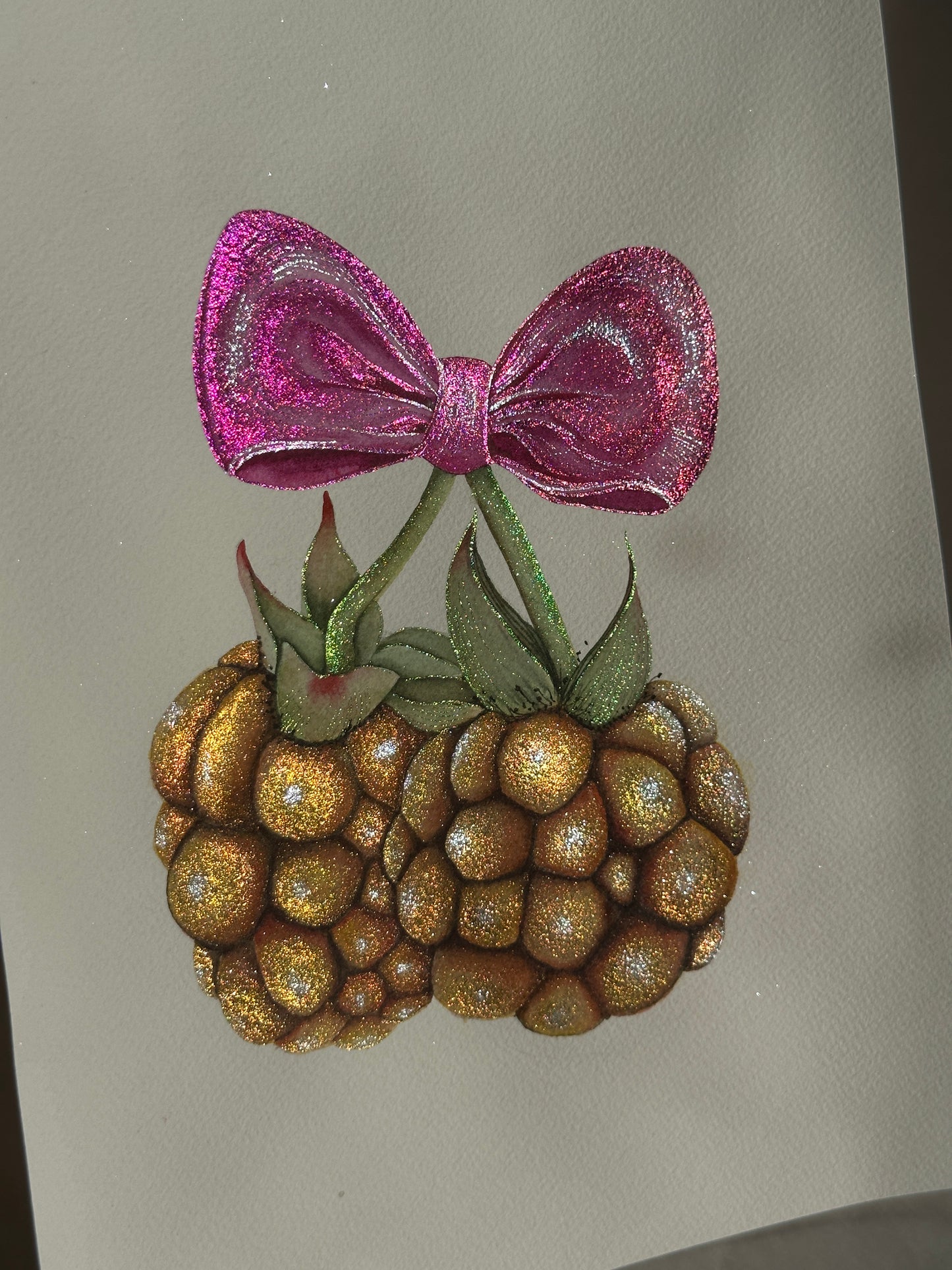 Golden raspberries in a purple kiss